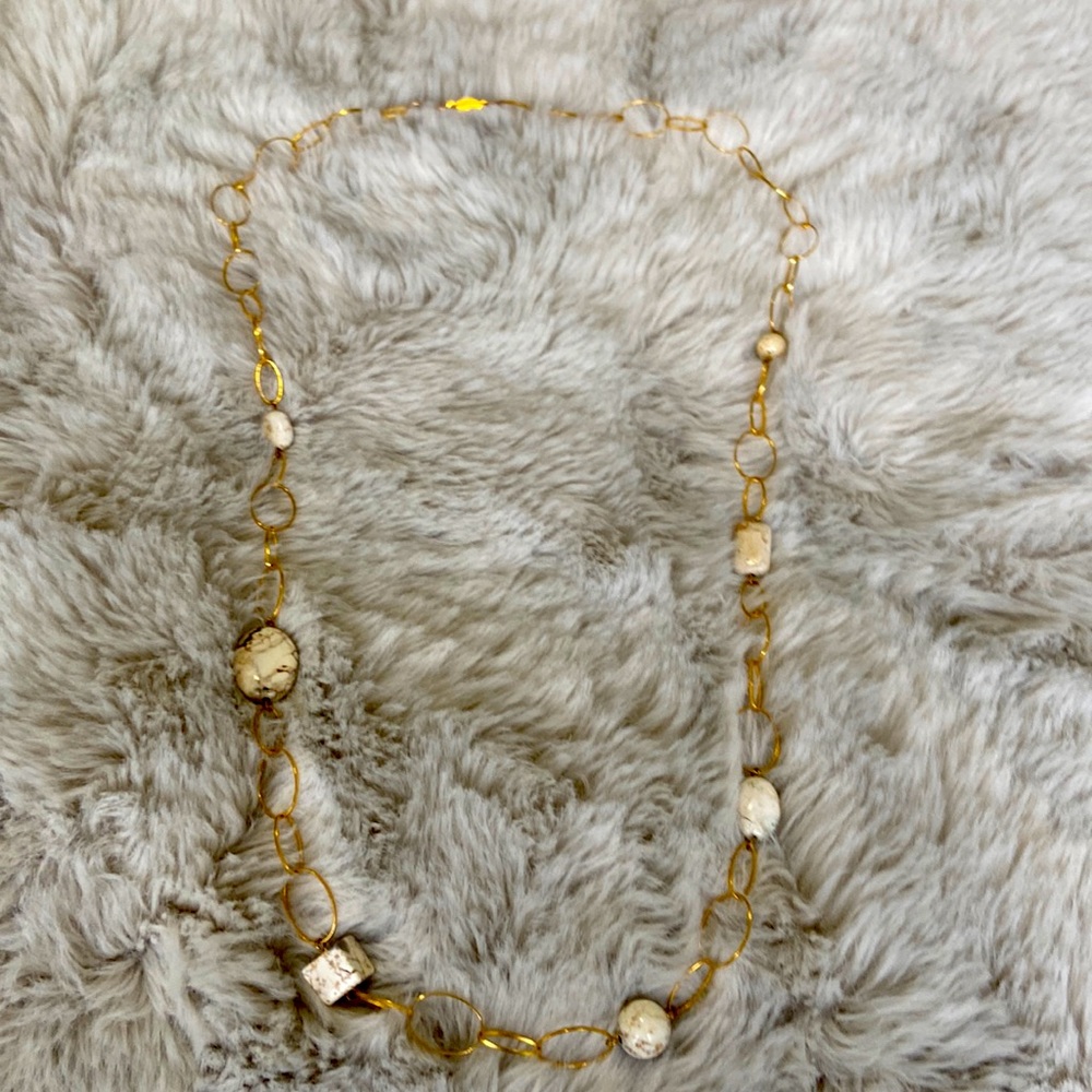 gold necklace with quartz stones